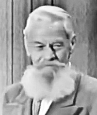 Rudolph Bismark Schlein (1885-1982). From his appearance on "What's My Line," posted at Find A Grave by jmconeby.